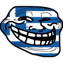 Troll face character with a wide, mischievous grin and the blue and white stripes of the Greek flag covering its face.