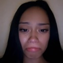 Person making an exaggerated, dramatic pouty face with lips pushed forward.
