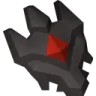 A jagged dark gray stone fragment with a glowing red diamond-shaped center.