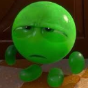 A green, rounded character with heavy eyelids looking down with a skeptical and unimpressed expression.