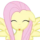 A yellow pony with long pink hair sticking its tongue out in a playful blep expression.