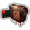 A camcorder covered in blood splatters and a red lipstick kiss mark.
