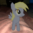 A small gray pony with a yellow mane stands on a textured surface.