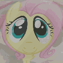 A yellow pony with pink hair looking up with large, wide, innocent blue eyes.