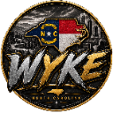 North Carolina state emblem featuring a flag design and the text WYKE in a metallic style.