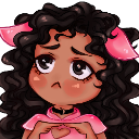 A girl with dark curly hair and pink cat ears looks up shyly while forming a heart shape with her hands.