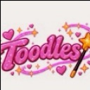 Toodles text in a bubbly pink font surrounded by sparkling stars and hearts with a magic wand on the right side.
