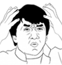 Man clutching his head with both hands in a state of extreme confusion and disbelief.