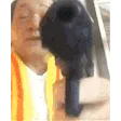 VietNaMeseManWavingHisGun