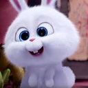 Snowball the white rabbit with large blue eyes and a wide, mischievous grin.