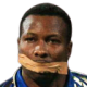A man with a piece of tan tape covering his mouth looking directly at the camera.
