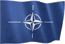 Four blue flags with white compass rose emblems waving in a rhythmic animation.