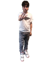 A young man standing in a casual pose wearing a white t-shirt and jeans.