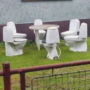 .э