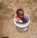 Kid in Bucket Eating Melon Discord sticker